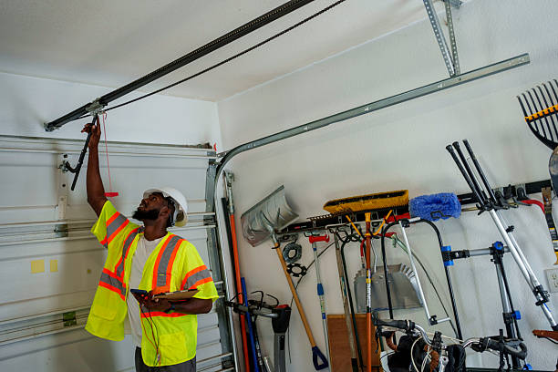 Professional Garage Door Panel Replacement technician working in New Paris, IN